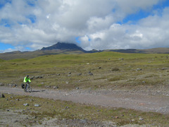 Riding through the desolate high alpine landscape of Cotopaxi National Park.