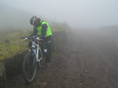 Cotopaxi National Park could go from sunny to foggy in a matter of hours.  Here, on a stop to put on raingear during our decent out of the park.