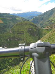The view over a gorge near Lake Quilotoa.  Note that despite the extremely steep slope, much of the land is still cultivated.