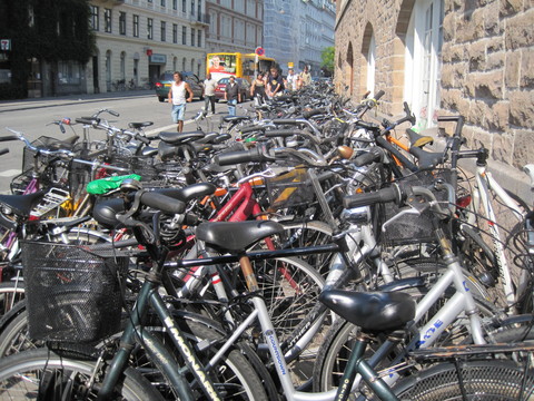 Bicycles outside a train station in Copenhagen, Denmark.