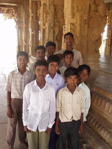 A group of boys who became entranced by my digital camera.