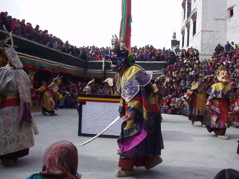 Dancing masked monks at the Spituk Festival, 2003.