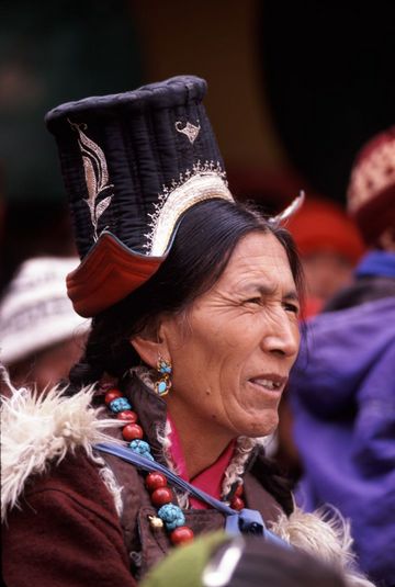Ladakhi woman watching the spectacle at the Spituk Winter Festival.
