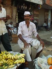 Man selling Bananas in Colaba, Mumbai.