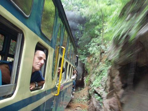 Herve, the French doctor, looking out of the window of the Ooty train.