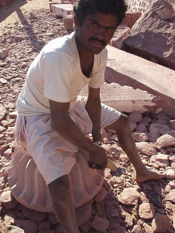 Man carving rock for an addition to a Jain temple, Osiyan, Rajasthan.