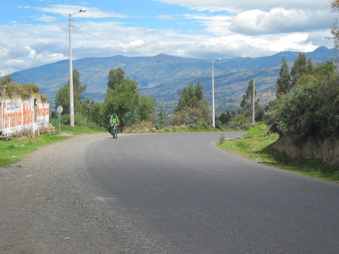 Biking uphill towards the Quilotoa loop.