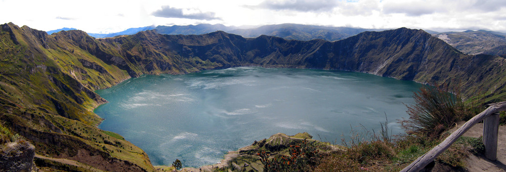 The view of Lake Quilotoa, a crater lake, provides a welcome reward for a day of climbing.
