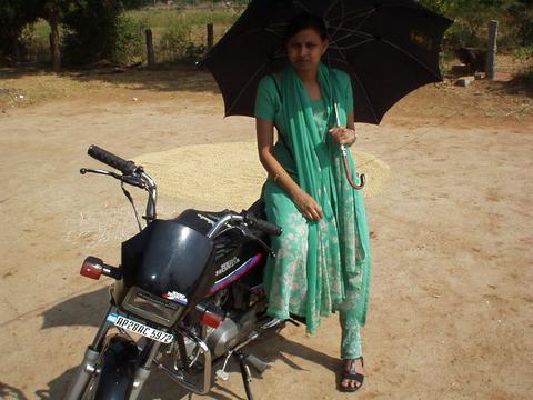 Preethi, looking very much the part of the memsahib, visiting the farm.