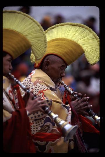 Monks playing gyalings at the winter festival at the Spituk Gompa, just outside of Leh in Ladakh, northern India.