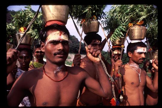 Hindu worshippers on top of a dam near Munnar, Kerala.