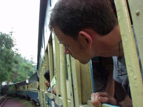 Yours truly, looking out the window on the way down from Ooty.