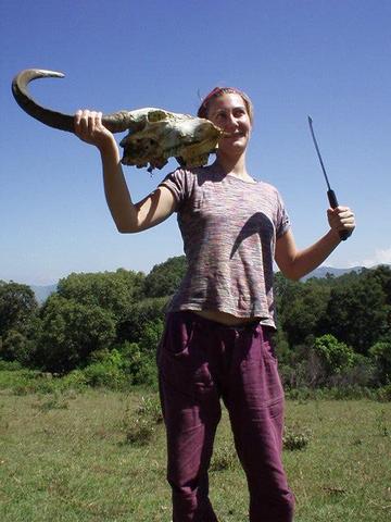 Angelique with water buffalo skull and machete.